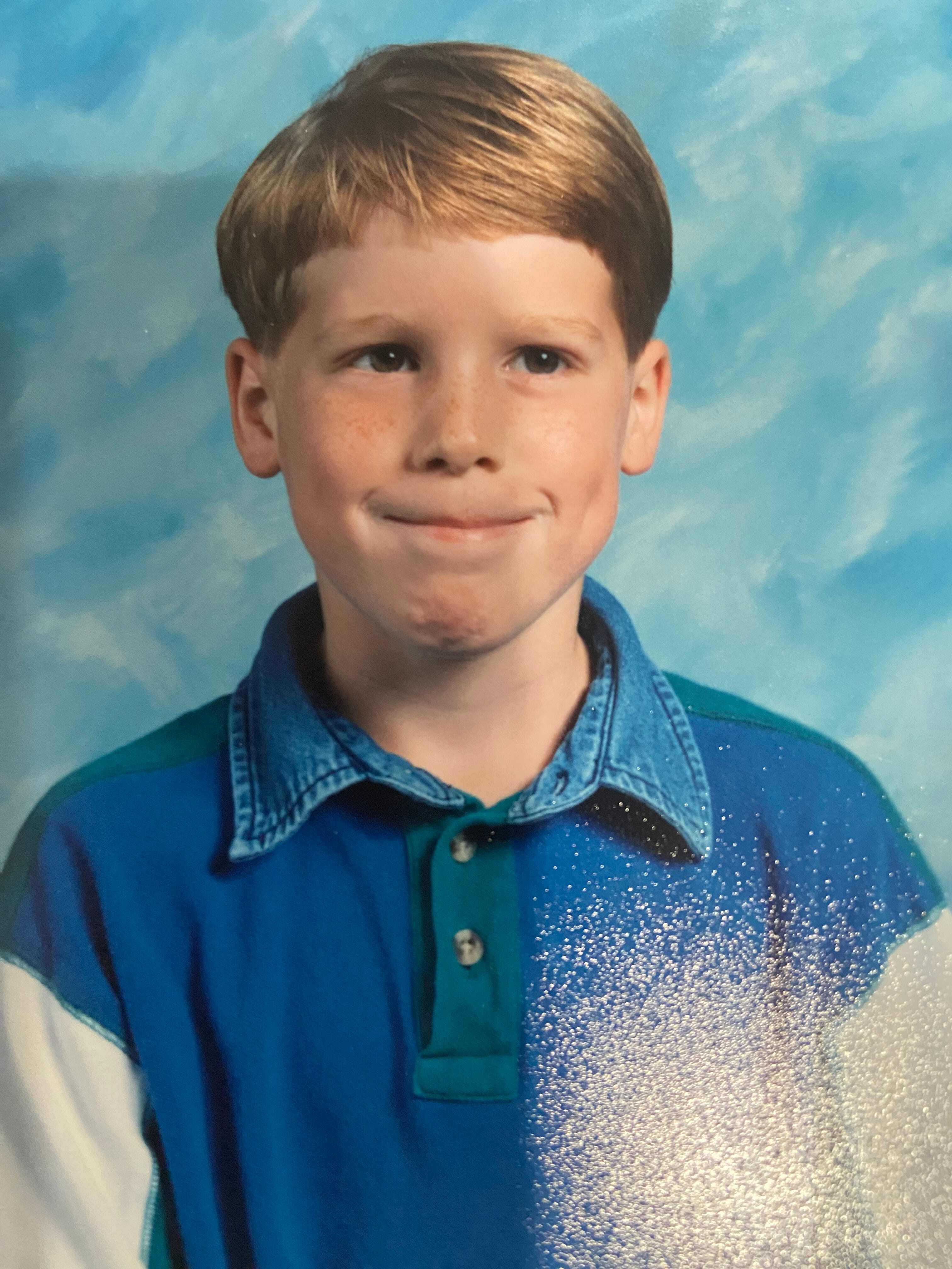 a young child's yearbook photo